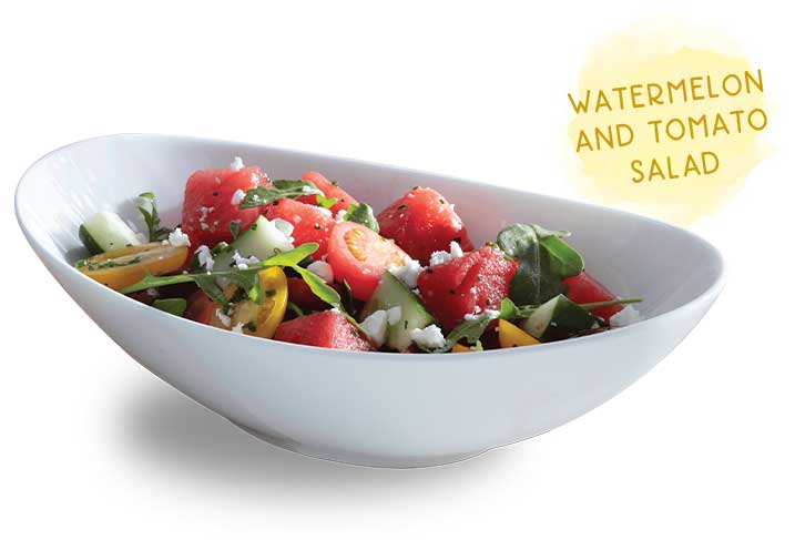 Watermelon and Tomato Salad topped with Feta cheese and tossed in a lime vinaigrette.