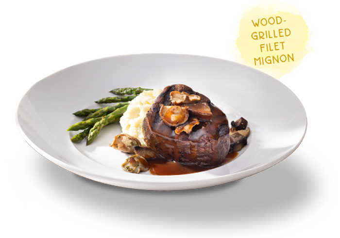 Wood-Grilled Filet Mignon with Asparagus, Yukon Mash, and topped with red wine sauce and mushrooms