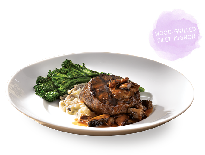 Wood-Grilled Filet Mignon with Yukon Mash and Broccolini, topped with Mushrooms and Red Wine Sauce.